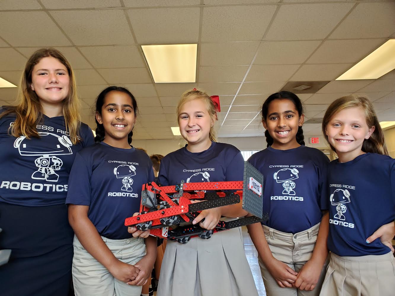 Level Up Automation donates $1,200 for all girls robotics team to compete in World Championships